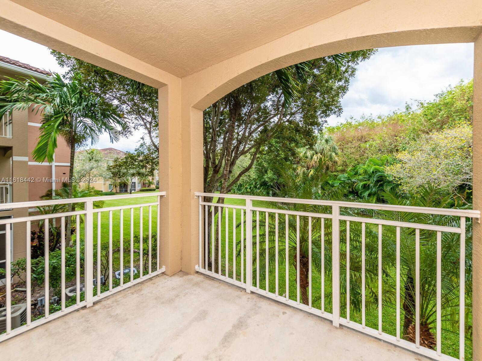 MINT CONDITION 1 bedroom 1 bath condo with attached Garage and beautiful canal and garden views! Open balcony. Open space living, dining, kitchen with granite counters, white cabinets, tile backsplash & stainless appliances. Tile flooring in living areas & wood floor in bedroom. Bathroom with shower doors & soaker tub. Spacious walk in closet. Washer and dryer in unit. Extra storage closet on balcony. Hurricane impact windows & sliding doors. Cable included. Amenities include clubhouse w/business center, 2 pools, tennis, grilling area, 2 fitness centers & putting green. Gated community. 5 mins to Turnpike, 6 miles to Bright Line, Cityplace and Palm Beaches. Unit is rented until 05/24/25 at $1,950. Great Investment Opportunity!
