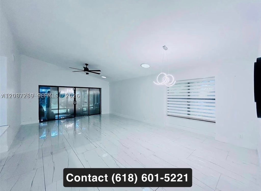 Photo of 2540 Calamondin Cir, Coconut Creek, FL 33063 (MLS # A12087289)