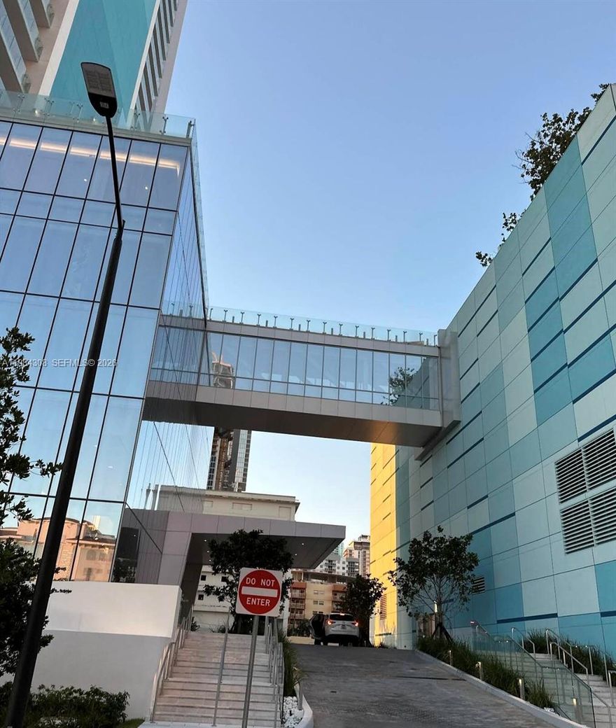 Unit 5006 at 700 NE 26th Ter sits on the 50th floor of one of Edgewater's most sought-after buildings, a light-filled oasis in the sky with panoramic views of the bay and city skyline.

Inside, the unit is big and bright, with floor-to-ceiling windows and an open layout that flows well between living, dining, and kitchen. The finishes are high-end throughout.

The building has full resort-level amenities: waterfront gym, palm-lined pool, tennis courts, and 24-hour concierge. And you're right in the middle of Edgewater, tucked in one of Miami's most peaceful, family-friendly enclaves, with easy access to Wynwood, Brickell, and the Design District.