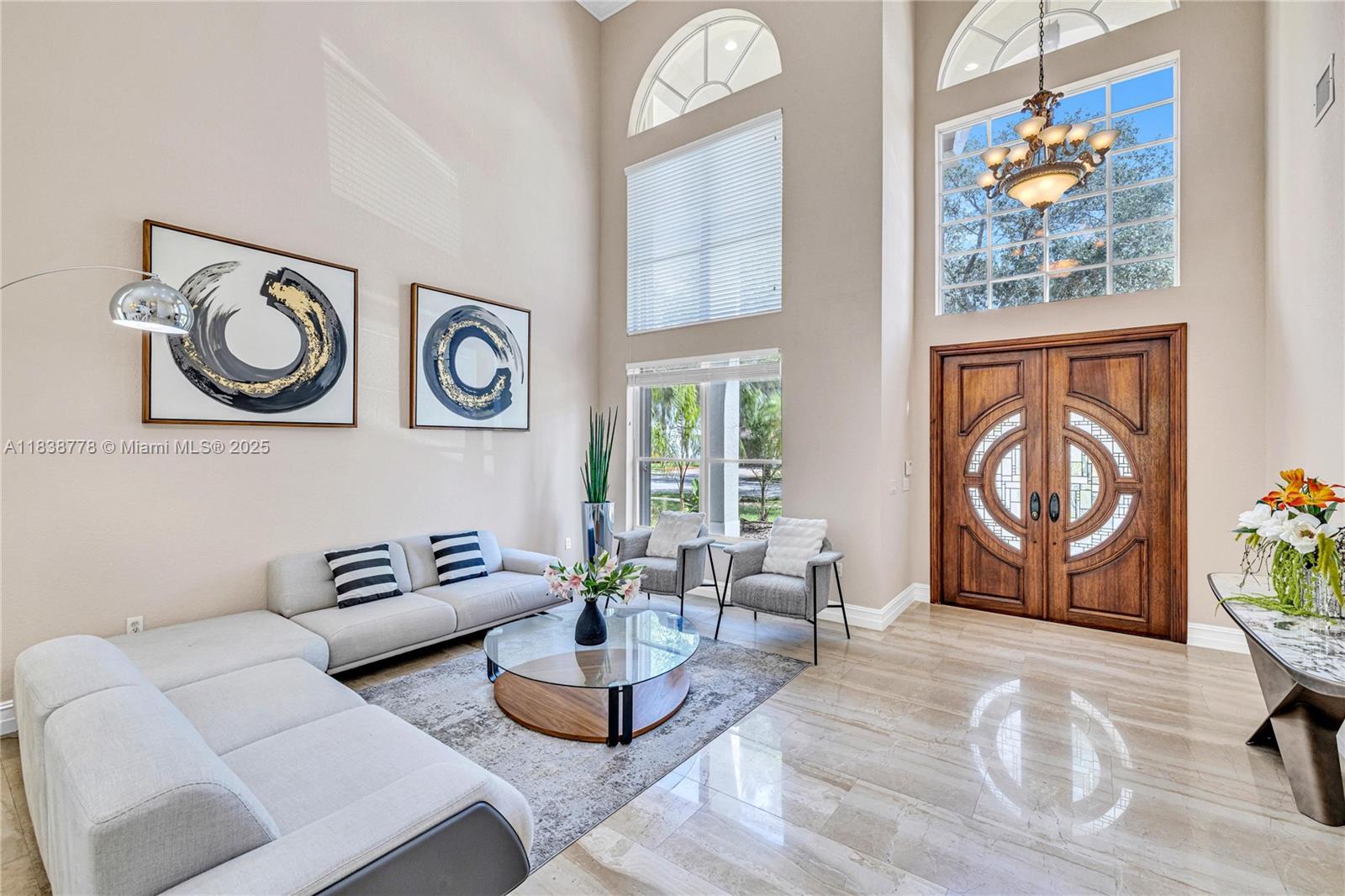 Welcome to this stunning 6-bedroom, 5-bath modern contemporary estate in the gated community of Isles of Sunset Lakes. Boasting over 4,000 SQ FT of living space, this resort-style home features high ceilings, a private pool, and an open layout ideal for family living and entertaining. Enjoy a spacious primary suite with a large walk-in closet, generous living areas, and abundant natural light. Located in a low-HOA community, residents have access to 8 tennis courts, a community pool, an oversized gym, and more. Conveniently close to Miramar Regional Park, top-rated schools, and major shopping centers, this home offers the perfect blend of comfort, convenience, and community.