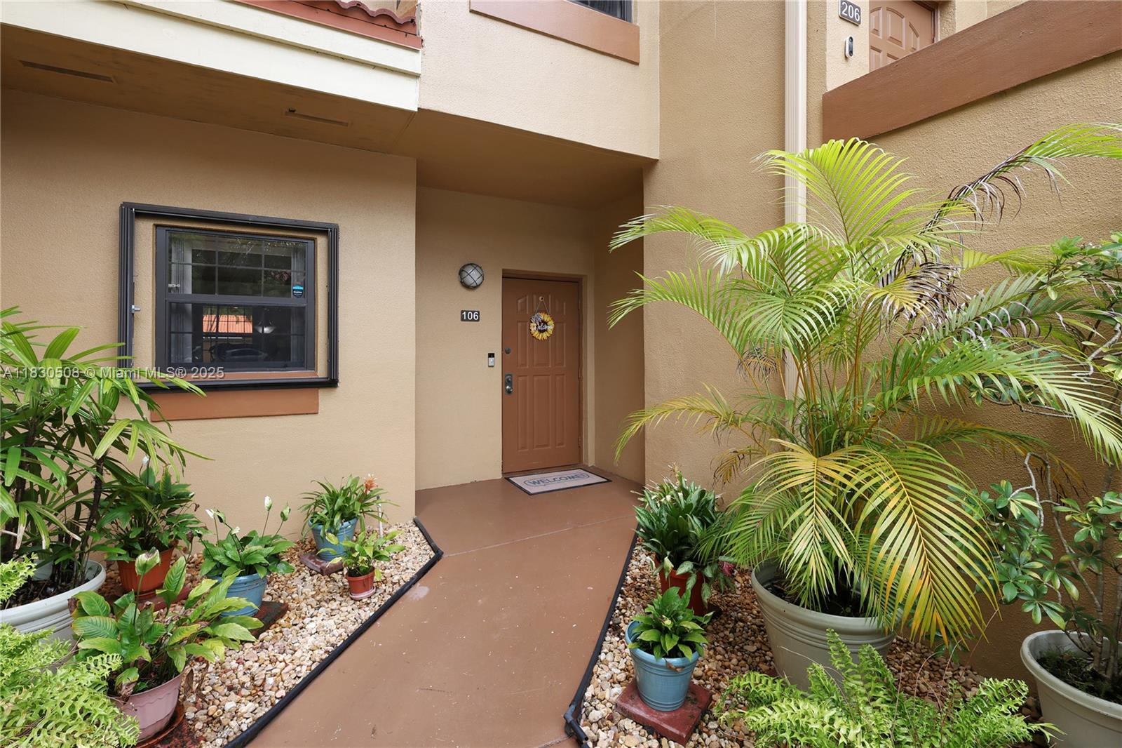 Welcome to this Beautifully updated 1st floor 2/2 condo in Celebration Point, located in the heart of Miami Lakes. Features a split floor plan with spacious master suite and walk-in closet, freshly painted, with new ceilings, light fixtures and new window blinds. Upgrades include new refrigerator, tankless water heater, thermostat, interior doors, accordion shutters throughout, in-unit washer/dryer and a new Roof installed in 2025. Relax in your screened-in patio and take advantage of extras like a Simply Safe security system with Ring doorbell and cameras. HOA includes water! Community offers pool, hot tub, clubhouse, BBQ areas, walking paths and 24-hr security. Steps from parks, trails, vibrant Main Street's entertainment with shopping & dining and all within a premier school district.