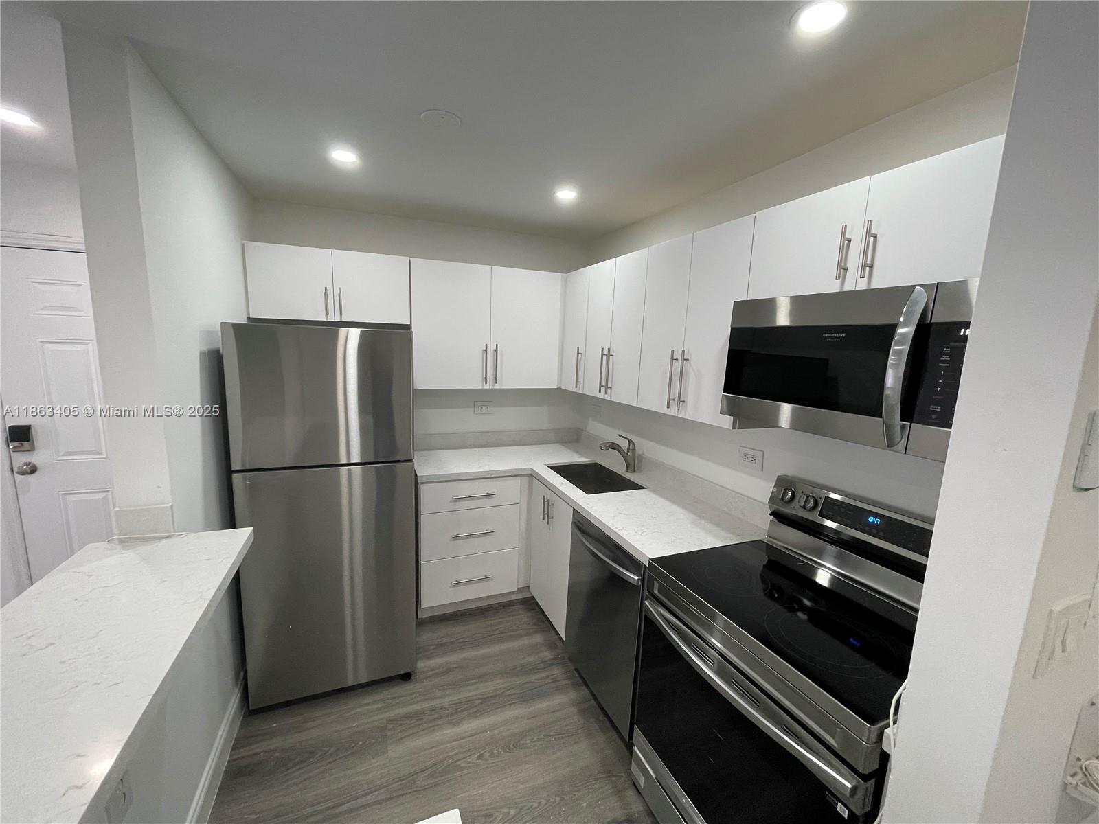 Modern 2-Bed/2-Bath Condo in Villa Bellini. Beautifully updated 2nd-floor condo featuring a private balcony in the sought-after gated community of Villa Bellini. This stylish unit offers a newly remodeled kitchen with quartz countertops, brand-new stainless steel appliances, a spacious custom walk-in closet in the primary bedroom, an in-unit washer/dryer, and a blend of laminate and tile flooring throughout. Residents of Villa Bellini enjoy resort-style amenities including a sparkling pool, fitness center, and tennis courts. Conveniently located near top-rated restaurants, shopping, parks, and with easy access to major highways, this home combines modern comfort with everyday convenience.