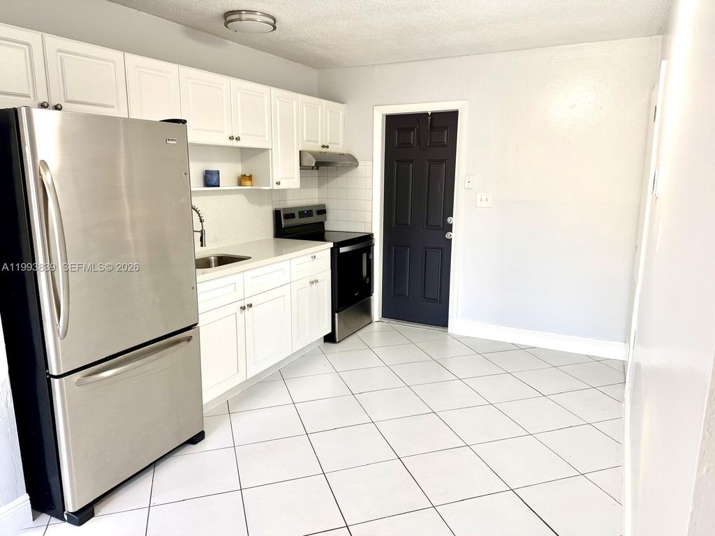 Photo of 1454 SW 33rd St #1-2, Fort Lauderdale, FL 33315 (MLS # A11993839)