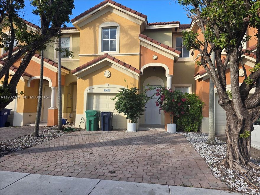 Great Location .This Beautiful Townhouse offers 4-Bedroom, 2.5-Bath + 1car garage & Lake view . Very upgraded with very nice kitchen ,all SS appliances ,porcelain on first floor & water proof lamine on second ,Spacious master suite &  a large bathroom. Enjoy a comfortable patio perfect for barbecues and outdoor entertaining. Convenient upstairs washer and dryer. Just a short walk to the community clubhouse and pool. Prime location near West Kendall Baptist Hospital, top-rated schools, shopping, and dining.Very convenient One car garage ,plus drive way for 2 or 3 cars ,and in addition the complex is plenty of visitors spaces . Easy access to the Florida Turnpike. Quick and easy to show. Showing by appointment only.