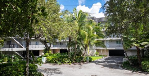 Photo of 6815 Edgewater Dr #309, Coral Gables, FL 33133 (MLS # A11893899)