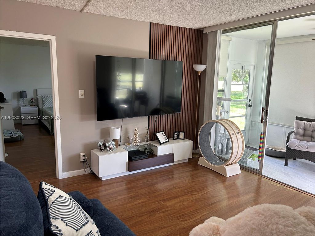 Photo of 8310 Sands Point Blvd #L110, Tamarac, FL 33321 (MLS # A12008023)