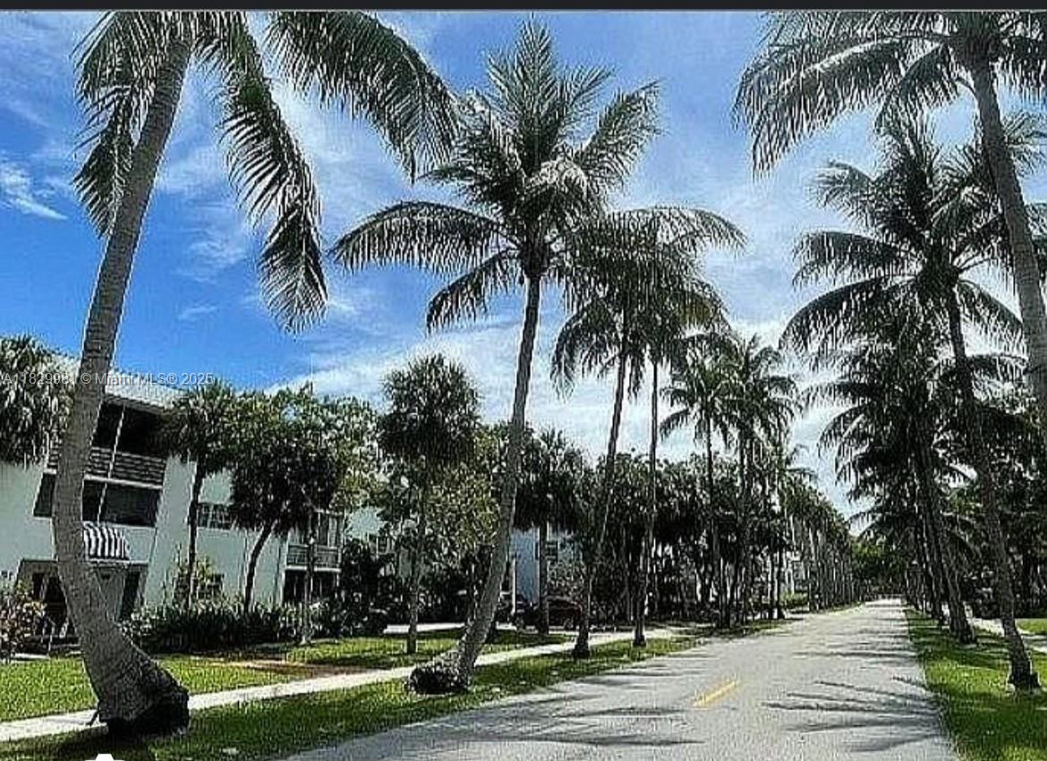 Bright and spacious corner unit located on the top floor of a well-maintained building in the heart of Key Biscayne. This 2-bedroom, 2-bath residence features ceramic floors throughout, a washer and dryer conveniently inside the unit, and is in very good condition. Enjoy privacy and natural light from every angle, along with peaceful tree-top views. The unit includes one assigned parking space and access to the building’s pool. Just a short walk from the beach, Village Green, shops, restaurants, and the highly rated Key Biscayne K-8 Center. Available now for annual rent — don’t miss the opportunity to live in one of Miami’s most desirable island communities!