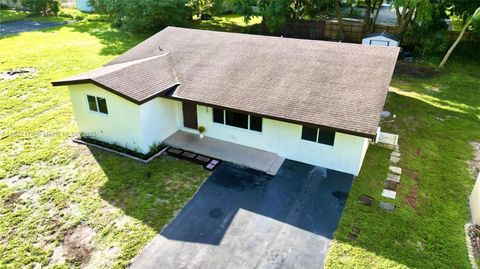 Photo of 4460 SW 59th Ct, Dania Beach, FL 33314 (MLS # A11872174)