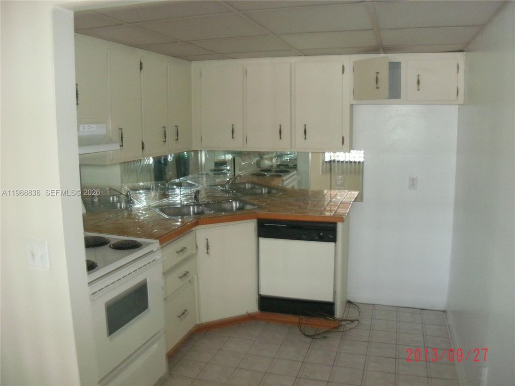 Photo of 1409 Lake Ave #5, Lake Worth, FL 33460 (MLS # A11988836)