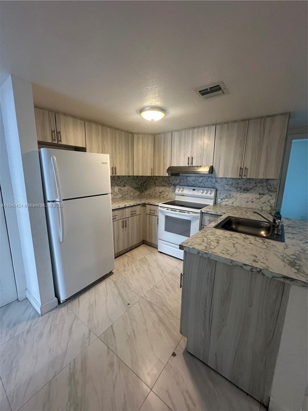 Photo of 3901 NW 9th Ave #2, Deerfield Beach, FL 33064 (MLS # A11842424)