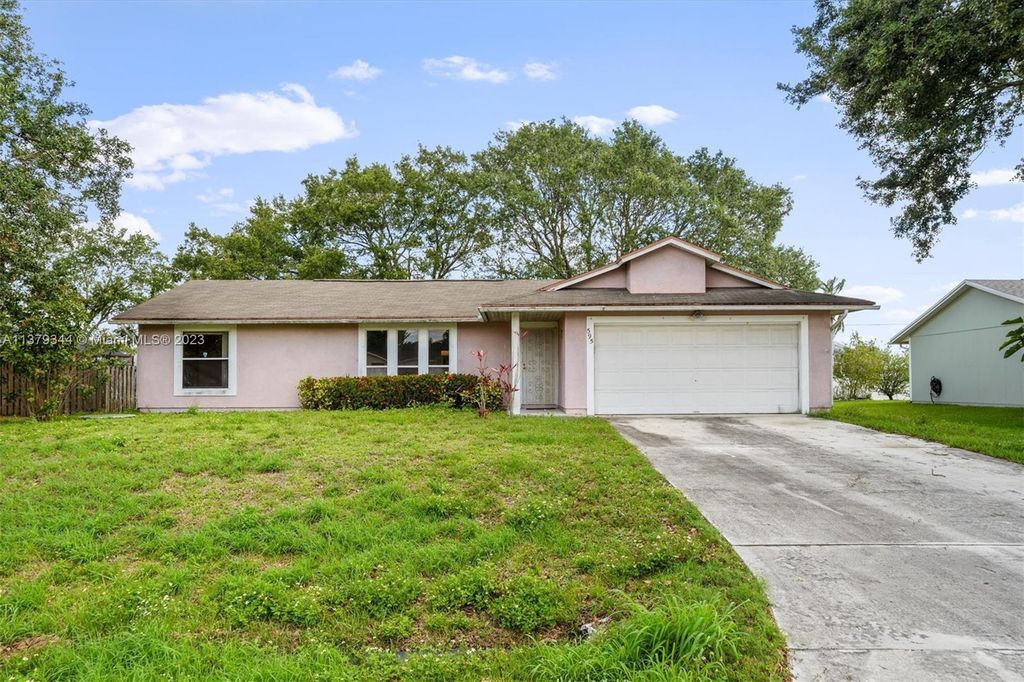 Photo of 595 SW Prado Ave, Port Saint Lucie, FL 34983 (MLS # A11379344)