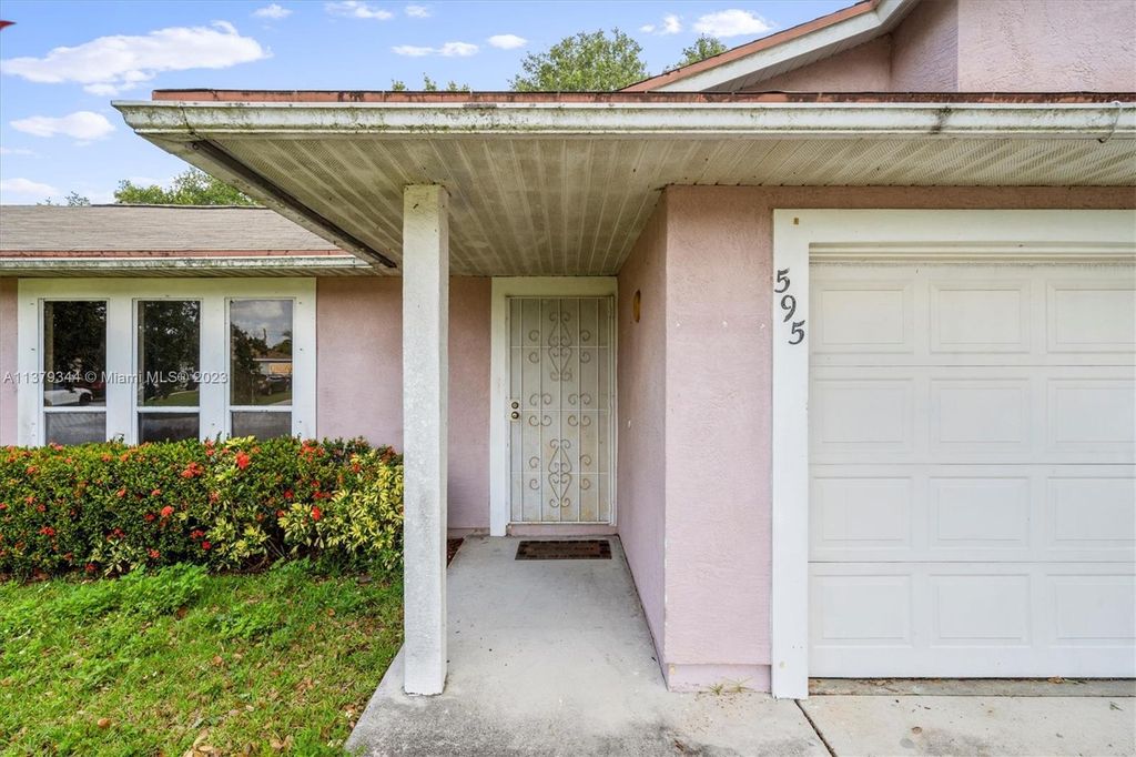 Photo of 595 SW Prado Ave, Port Saint Lucie, FL 34983 (MLS # A11379344)