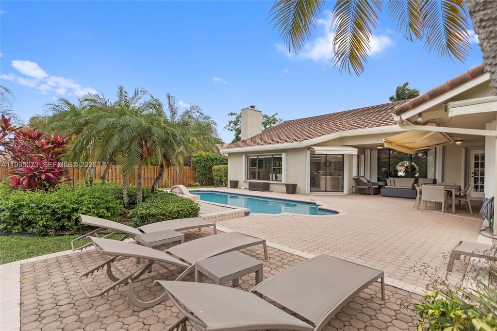 Photo of 11021 NW 7th St, Plantation, FL 33324 (MLS # A11995073)