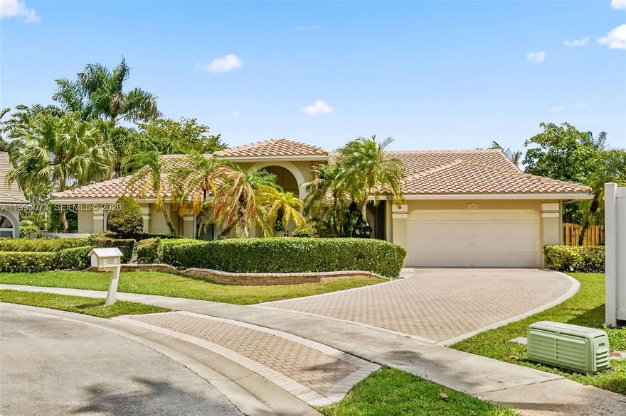 SPECTACULAR HOME IN THE PRESTIGIOUS WESTPORT COMMUNITY! This light, bright, and modern one-story residence is truly turnkey; just bring your toothbrush and move right in. Featuring 4 bedrooms and 2.5 baths, the home offers an open, inviting floor plan with vaulted ceilings, designer finishes, and abundant natural light throughout.

The state-of-the-art kitchen includes stainless steel appliances, a center island, and ample space for entertaining. The spacious primary suite offers two walk-in closets and overlooks your private backyard oasis. Step outside to enjoy a heated pool, an expansive patio, and a beautifully landscaped setting, perfect for relaxing or hosting guests.

Major upgrade includes a brand-new tile roof (2025), approximately 1 year old, providing peace of mind and long-term value. Additional features include a 2-car garage, paver driveway, and updated systems.

Ideally located near Jacaranda Golf & Country Club, Sawgrass Mills, major highways, fine dining, and top shopping destinations. Easy to show. This is a rare opportunity to own a move-in-ready, home in one of Plantation’s most sought-after neighborhoods.