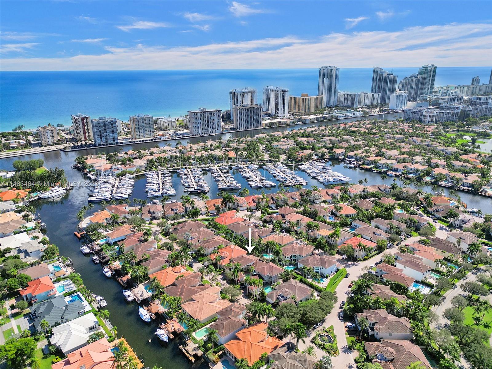 Located on a quiet tree lined street in the prestigious gated community of Harbor Islands. Very well-maintained courtyard home with a 1st floor primary bedroom. All the rooms are large and filled with light. 3 bedrooms plus a guest house. Original owners have kept this home in top condition. All landscaping is maintained by the association so you can enjoy the amenities like the on-site health spa, full-service marina, lighted tennis courts or take a walk in the community’s 20-acre park.