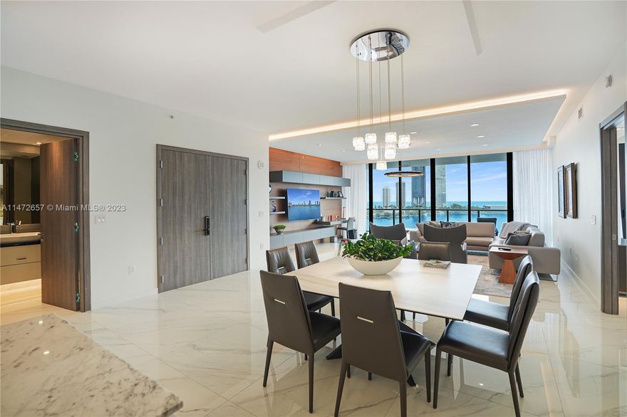 Tucked away in an exclusive 8 acres private island surrounded by Intracoastal Waterway, Prive Island Estates offer 70,000 SQ FT of luxury amenities and services. Enjoy Prive lifestyle with unobstructed water views from the moment you get to the island. Financing Available for International Buyers!!! Ask for more info. Getting off your private elevator you enter a bright and spacious residence boasting expansive water views and 10 FT tall ceilings.
Offered fully furnished this residence represents the true meaning of the word Exclusivity. Entertain your guests on a 10FT deep east terrace equipped with a summer kitchen. Treat yourself with the ability to start your day by greeting gorgeous sunrises in the mornings and watch the stunning sunsets in the evenings.