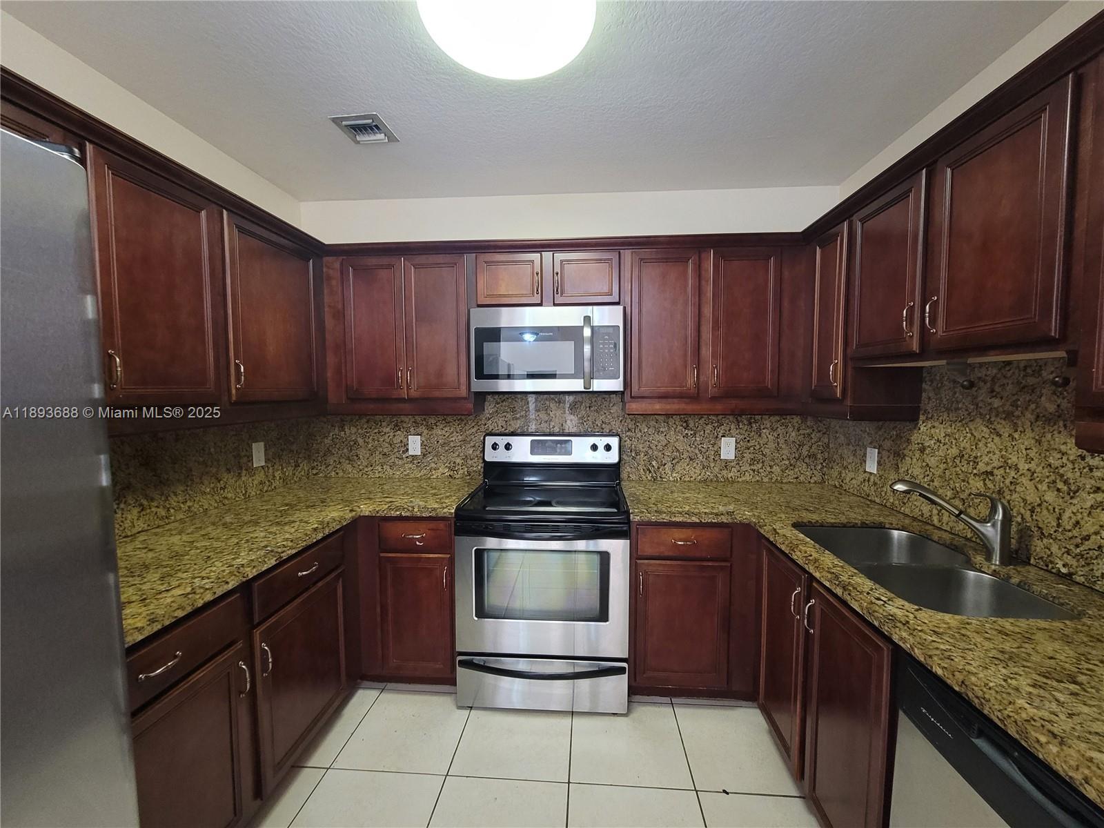 Step into comfort and style with this modern 2-bed, 2-bath apartment just steps from Coral Gables. Enjoy a sleek kitchen with granite countertops, stainless steel appliances, and tile floors throughout. The open layout is perfect for living and entertaining. Includes two assigned covered parking spaces—a rare Miami perk! Relax at the rooftop pool with stunning city views. Prime location minutes from Downtown, Coconut Grove, Brickell, top dining, shopping, and Miami International Airport. Experience the best of Miami living—schedule your showing today!