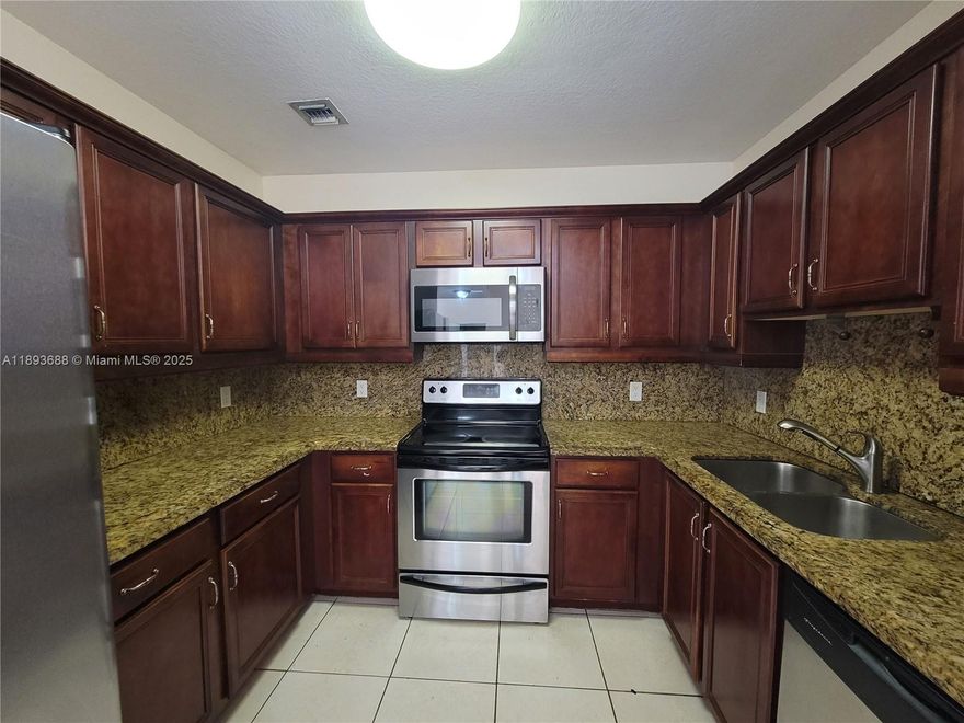 Step into comfort and style with this modern 2-bed, 2-bath apartment just steps from Coral Gables. Enjoy a sleek kitchen with granite countertops, stainless steel appliances, and tile floors throughout. The open layout is perfect for living and entertaining. Includes two assigned covered parking spaces—a rare Miami perk! Relax at the rooftop pool with stunning city views. Prime location minutes from Downtown, Coconut Grove, Brickell, top dining, shopping, and Miami International Airport. Experience the best of Miami living—schedule your showing today!