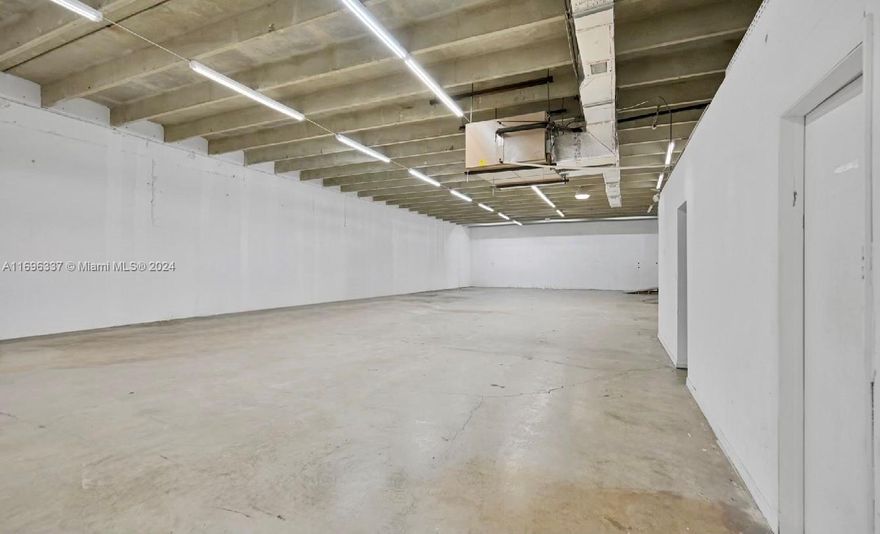 This prime commercial building, located in Wynwood’s coveted 5th Avenue quadrant, offers a highly adaptable space with significant potential for diverse uses. The building is ideal for a state-of-the-art office, showroom, sports and entertainment venue, or food and beverage establishment. Designed for efficiency, the property features an open floor plan with high ceilings, twin-T construction, a column-free layout, and pre-installed stubbed-out utilities, making it ready for immediate use or customized redevelopment.

The property’s outstanding location places it just steps from popular Wynwood destinations such as Dante’s Hi-Fi and Love Life Cafe.