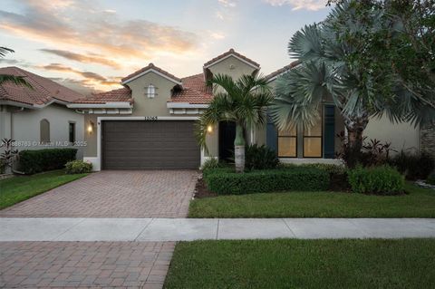 Photo of 12065 N Kalmar Cir, Parkland, FL 33076 (MLS # A11888763)