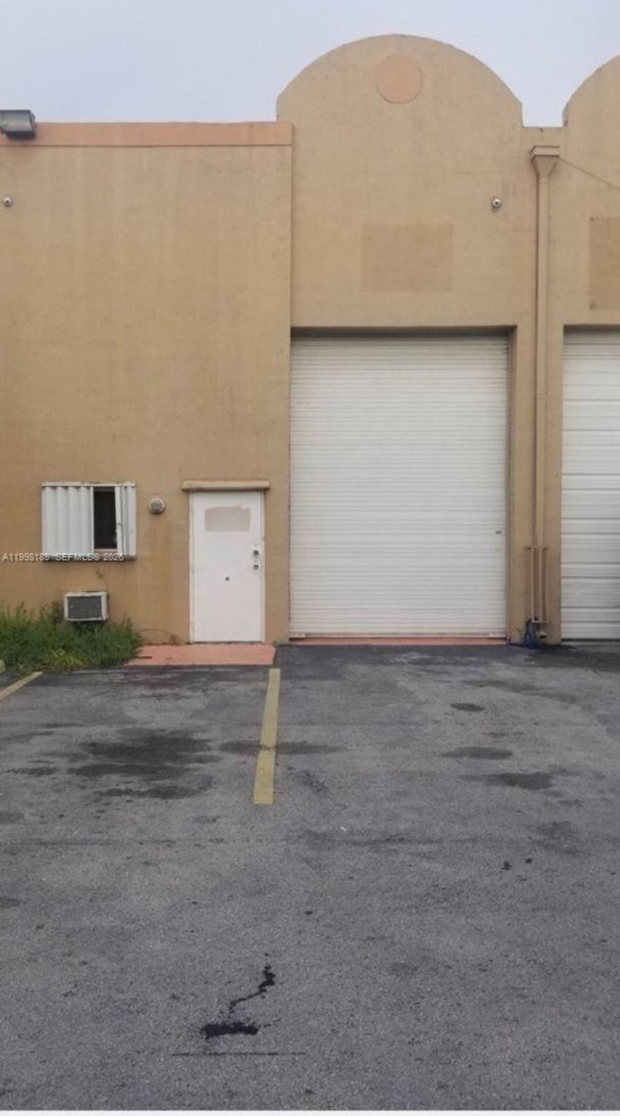 Turnkey 1,300 sq ft two story warehouse flex space completely remodeled and ready for operation. This secure, modern unit features functional private offices, a private bathroom, and versatile open space ideal for light manufacturing, craftsmanship, or professional workspace. Includes 2 assigned parking spaces and security camera system. Perfect for entrepreneurs seeking a high-end, secure location.