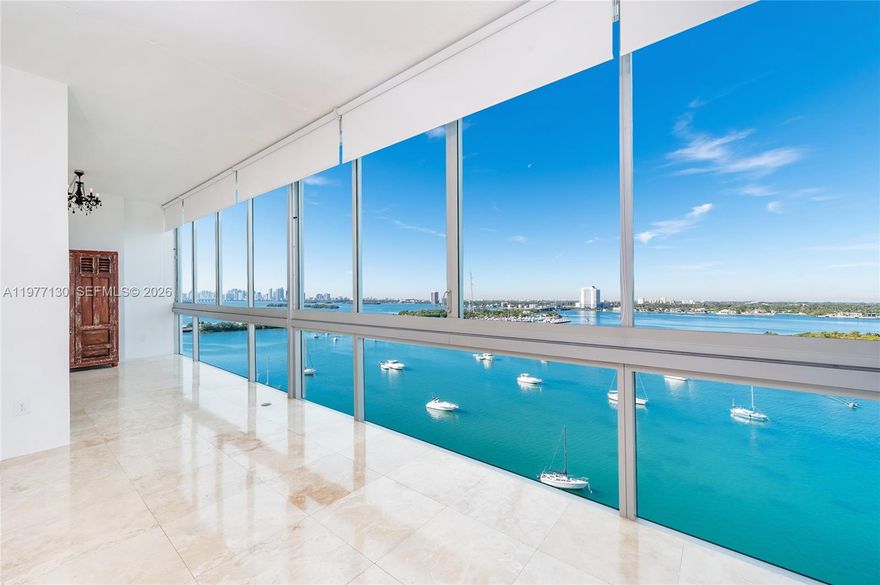 GORGEOUS 2BR/2BA CORNER BAYFRONT DREAM LOFT! 
Enjoy breathtaking DIRECT BAY VIEWS, DOLPHIN SIGHTINGS, SPECTACULAR SUNSETS, and the DAZZLING MIAMI SKYLINE from this stunning waterfront residence.
The 1,906 SF FLEXIBLE LAYOUT offers generous living space and can easily be adapted into a LARGE OPEN LOFT or even a 3-BEDROOM CONFIGURATION. Features include a DESIGNER OPEN KITCHEN renovated in 2023, soaring 12’ CEILINGS, and FLOOR-TO-CEILING WINDOWS with dual shades that flood the home with natural light. Elegant TRAVERTINE FLOORS run throughout.
The large PRIMARY BEDROOM FEATURES DOUBLE SINKS and WALK-IN CLOSETS. Unique artistic details add character, including BARN WOOD DOORS and an ECLECTIC ARMOIRE with BUILT-IN WET BAR, perfect for entertaining.
This residence includes 2 PARKING SPACES, plus GUEST PARKING and EV CHARGING STATIONS.
Located in SPACE 01, a boutique bayfront building in EXCELLENT FINANCIAL and STRUCTURAL CONDITION with LOW HOA FEES. Amenities include SECURE ENTRY, ROOFTOP POOL & HOT TUB, FITNESS CENTER, BAYFRONT WALKWAY, and BBQ AREA.
PET-FRIENDLY and 6-MONTH RENTALS ALLOWED.
CENTRALLY LOCATED IN THE UP-AND-COMING CITY OF NORTH BAY VILLAGE, just minutes from SOUTH BEACH, MIA AIRPORT, DOWNTOWN MIAMI, DESIGN DISTRICT, and BAL HARBOUR.
You’ll fall in love with this HARBOR ISLAND BEAUTY!
