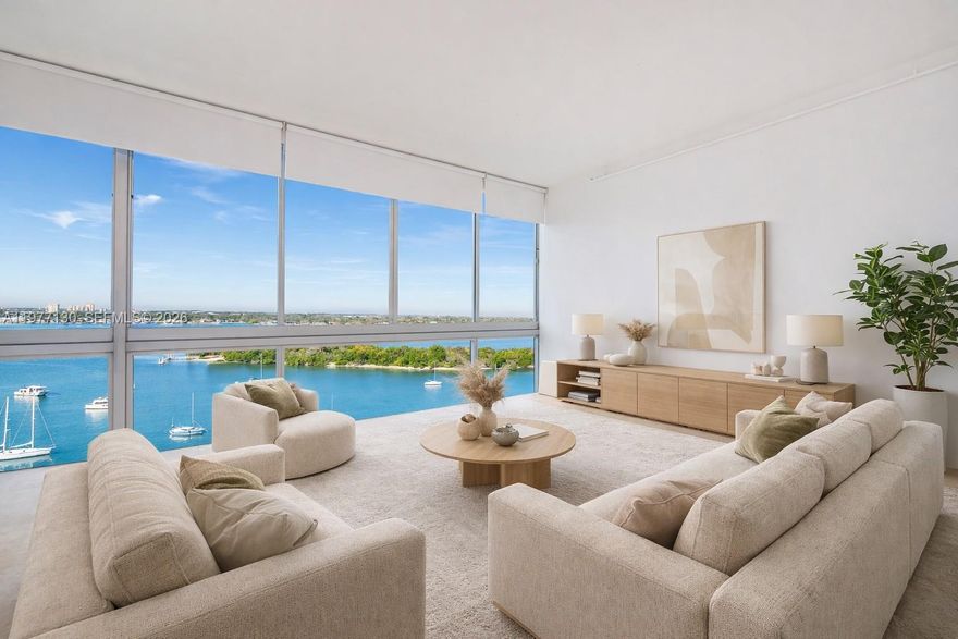 CORNER BAYFRONT DREAM LOFT! This stunning 1,906 SF loft delivers the kind of space and flexibility that is rare on the water. Two LOFT-STYLE PARTITIONED BEDROOMS preserve the dramatic, airy feel while offering true private retreats — with the option to open entirely or configure into a 3-BEDROOM layout. Wake up to DIRECT BAY VIEWS, DOLPHIN SIGHTINGS, and the DAZZLING MIAMI SKYLINE. Inside, soaring 12' CEILINGS, FLOOR-TO-CEILING WINDOWS, a DESIGNER OPEN KITCHEN renovated in 2023, and elegant TRAVERTINE FLOORS create an effortlessly sophisticated home. The large PRIMARY BEDROOM features DOUBLE SINKS and WALK-IN CLOSETS. SPACE 01 is a boutique bayfront building in the heart of NORTH BAY VILLAGE — one of Miami's most exciting emerging waterfront communities, with major developments including PAGANI, SHOMA BAY, and CONTINUUM already transforming the area. This building is in EXCELLENT FINANCIAL and STRUCTURAL CONDITION with LOW HOA FEES. Amenities include a ROOFTOP POOL & HOT TUB, FITNESS CENTER, BAYFRONT WALKWAY, BBQ AREA, and SECURE ENTRY. TWO PARKING SPACES, GUEST PARKING, and EV CHARGING STATIONS included. PET-FRIENDLY. 6-MONTH RENTALS ALLOWED. Minutes from SOUTH BEACH, DOWNTOWN MIAMI, the DESIGN DISTRICT, BAL HARBOUR, and MIA AIRPORT. You'll fall in love with this HARBOR ISLAND BEAUTY!