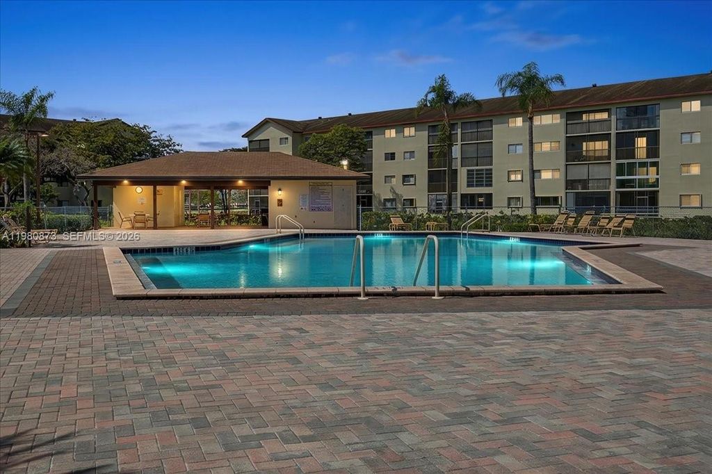 Photo of 1600 SW 127th Way #102C, Pembroke Pines, FL 33027 (MLS # A11980873)