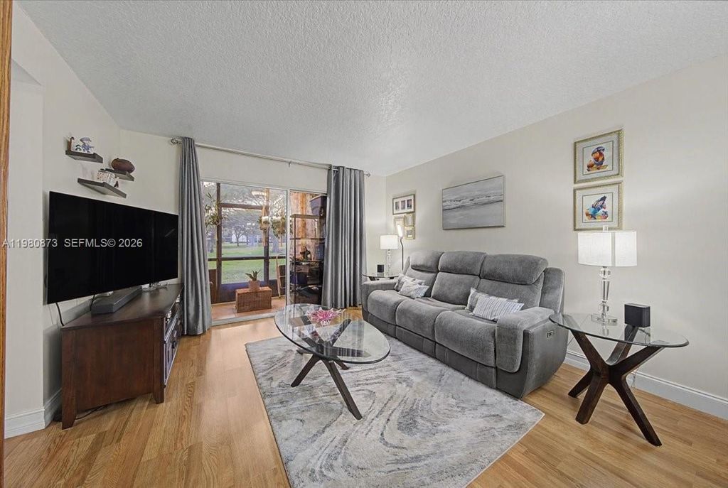 Photo of 1600 SW 127th Way #102C, Pembroke Pines, FL 33027 (MLS # A11980873)