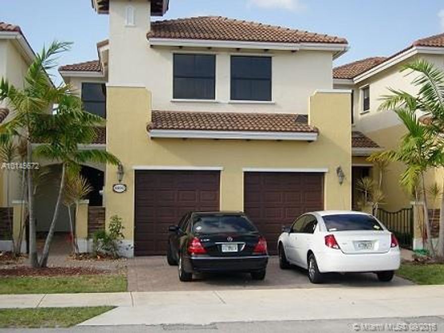 LOCATED IN TRELLIS AT BAYSHORE INSIDE LAKES BY THE BAY,THIS 4 BED,2.5 BATH,SPACIUS COACH HOME FEATURES LARGE LIVING AREAS & 2 CAR GARAGE.ALL WOOD FLOORS APPLIANCES & KITCHEN WITH GRANITE COUNTER TOPS FENCED REAR PATIO MAKES THIS ABREAT HOME FOR ENTERTAINENG PROPERTY BANK UP TO PROTECTED PRESERVE SO NO REAR NEIGHBORS COMMUNITY FEATURES LANGE CLUB HOUSE AND POOL GATED ENTRY.