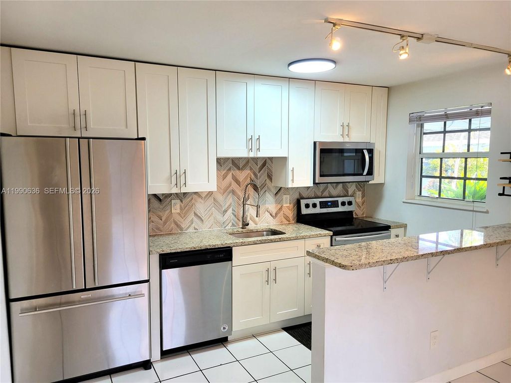 Photo of 125 NW 25th St #129, Wilton Manors, FL 33311 (MLS # A11990636)