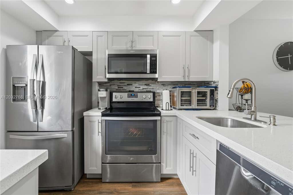 Photo of 9340 Lagoon Pl #304, Davie, FL 33324 (MLS # A12032768)
