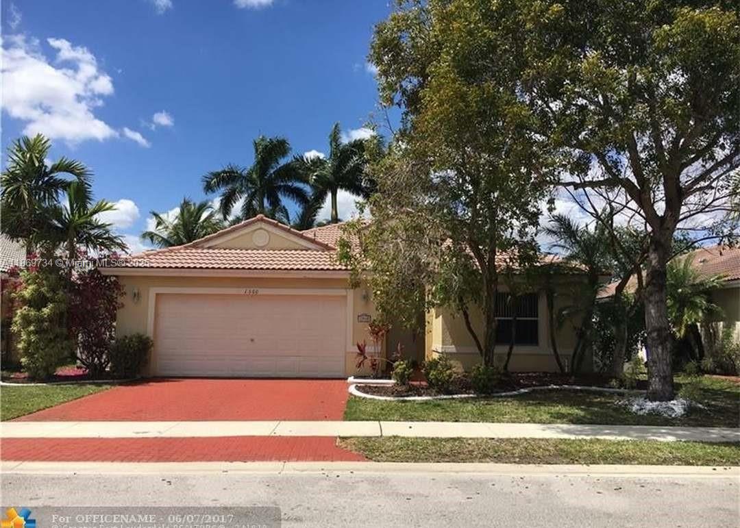 Welcome to Encantada one of West Pembroke Pines most sought after communities.
This 4-bedroom, 3-bathroom home with a 2-car garage offers great potential for the perfect family. While the home needs some TLC, a credit for repairs will be provided. The spacious split floor plan layout is ideal for entertaining, and the primary suite includes a custom walk-in closet, bathroom with dual sinks, separate shower and tub. The screened-in patio is perfect for relaxing outdoors. Conveniently located near A+ schools, Pembroke Lakes Mall, and The Shops at Pembroke Gardens, this home presents an opportunity to customize and make it your own.