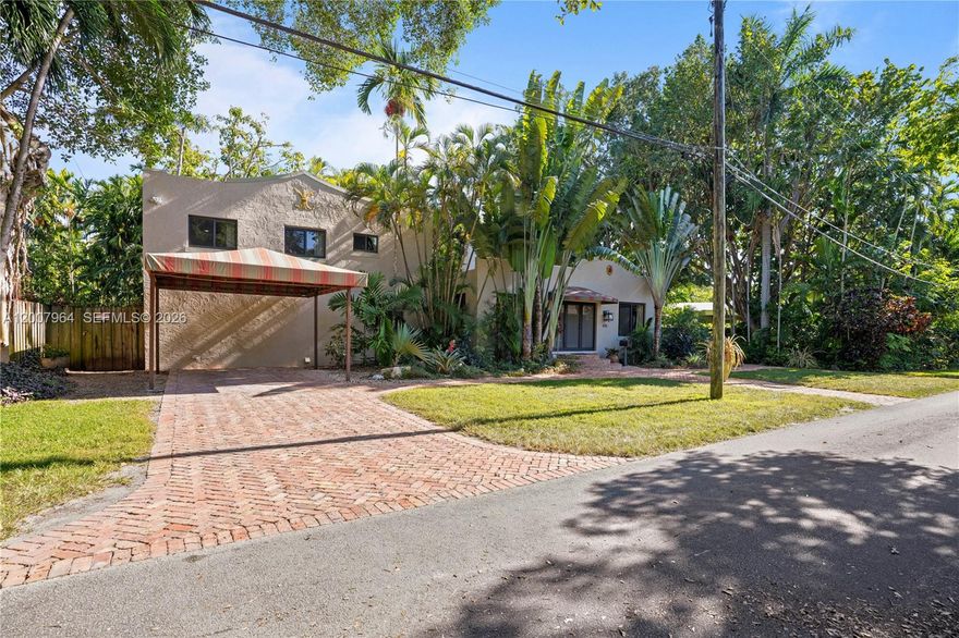 Welcome to The Grand Dame of Biscayne Park—a stunning Spanish-style home infused with artistic modern touches, set on an expansive 15,000+ sq ft tropical paradise. This is a one-of-a-kind home in Biscayne Park.
This 4-bedroom, 3-bathroom residence offers over 2,400 sq ft of thoughtfully designed living space. Originally reimagined in 2015, the home features impact windows, gorgeous fireplace updated plumbing, electrical, septic tank (2014) plus bamboo flooring, and stainless steel appliances throughout… a large open kitchen.
The first floor offers a 3-bedroom, 2-bath layout, along with a versatile family room that can easily transform into a media room, playroom, or home office—tailored to fit your lifestyle.
Upstairs, the private oversized primary suite retreat provides a peaceful escape, complete with a spacious spa-style bathroom and generous proportions.
Step outside to a true backyard oasis—featuring a lush pool, lush landscaping, 125 year old mature trees, and a large patio ideal for lounging and entertaining in your own serene tropical setting. Water filtration system throughout the entire house.
Perfectly located near Miami Country Day School, this one-of-a-kind property combines charm, privacy, and modern comfort in one of South Florida’s most desirable neighborhoods.