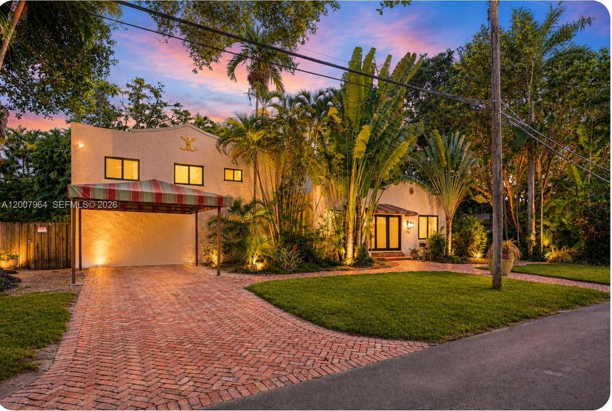One of the largest lots in Biscayne Park—a stunning Spanish-style home infused with artistic modern touches, set on an expansive 15,000+ sq ft tropical paradise + oversize pool and gushing waterfall.. This is a one-of-a-kind home in Biscayne Park.
This 4-bedroom, 3-bathroom residence offers over 2,400 sq ft of thoughtfully designed living space. Gut renovation cira 2015. The home features impact windows, sweet fireplace, updated plumbing, updated electrical, septic tank (2016), new drain field, bamboo flooring, plus stainless steel appliances… a large open kitchen. Great for entertaining.
The first floor offers a 3-bedroom, 2-bath layout, along with a versatile family room that can easily transform into a media room, family room, playroom, or home office—tailored to fit your lifestyle.
Upstairs, the private oversized primary suite retreat provides a peaceful escape, complete with a spacious spa-style bathroom and generous proportions.
Step outside to a true backyard oasis—featuring a lush pool, lush landscaping, 125 year old mature trees, and a large patio ideal for lounging and entertaining in your own serene tropical setting. Water filtration system throughout the entire house.
Perfectly located near Miami Country Day School, this one-of-a-kind property combines charm, privacy, and modern comfort in one of South Florida’s most desirable neighborhoods.