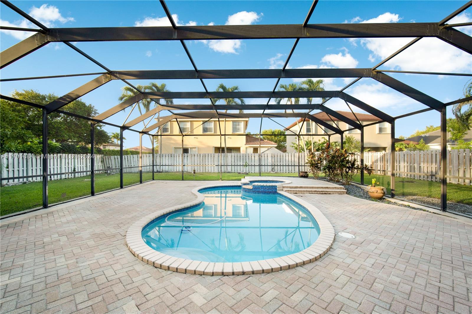 Discover the epitome of suburban bliss in this stunning 4-bed, 3-bath pool home, nestled at the peaceful end of a cul-de-sac in a vibrant neighborhood with green areas. This inviting home offers a harmonious blend of comfort and elegance, featuring spacious, sun-lit rooms and a modern, open-plan layout perfect for relaxation and entertaining. The heart of the home is the beautiful, fully-equipped kitchen, which flows seamlessly into a cozy living area. the bedrooms provide serene retreats with ample space and soothing views. Step outside to your private oasis where a sparkling pool awaits (weekly pool service included in rent), set in a manicured garden - a perfect spot for leisurely weekends. There is something for everyone.
