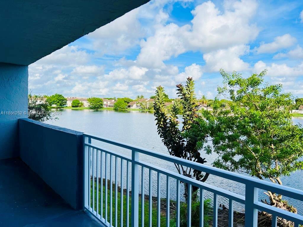 Ready to move in unit with phenomenal lake view!! Complex features pool, spa, and child playground. 24/7 security, gated community. It won't last!!