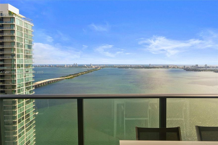Gorgeous 2 bed 2 bath plus den high floor flat in the luxury Gran Paraiso condo! Amazing and magnetic water view from living room, master bedroom and beautiful oversize terrace overlooking Biscayne Bay. The apartment comes furnished (Italian high end brands) and features wood porcelain floor all over, Wolf built in appliances, kitchen isle with sink and dishwasher, electrical blinds and sheers, walk-in and built-in closets.
Incredible amenities, including gyms (cardio, weights and yoga room), 2 tennis court, SPA, business center, cigar room, wonderful round infinity pool, club room within many others.
Great appreciation is coming from the continuous development of Edgewater and the opening of all the retail spaces at the ground floor of the 4 condo.
Price is firm.