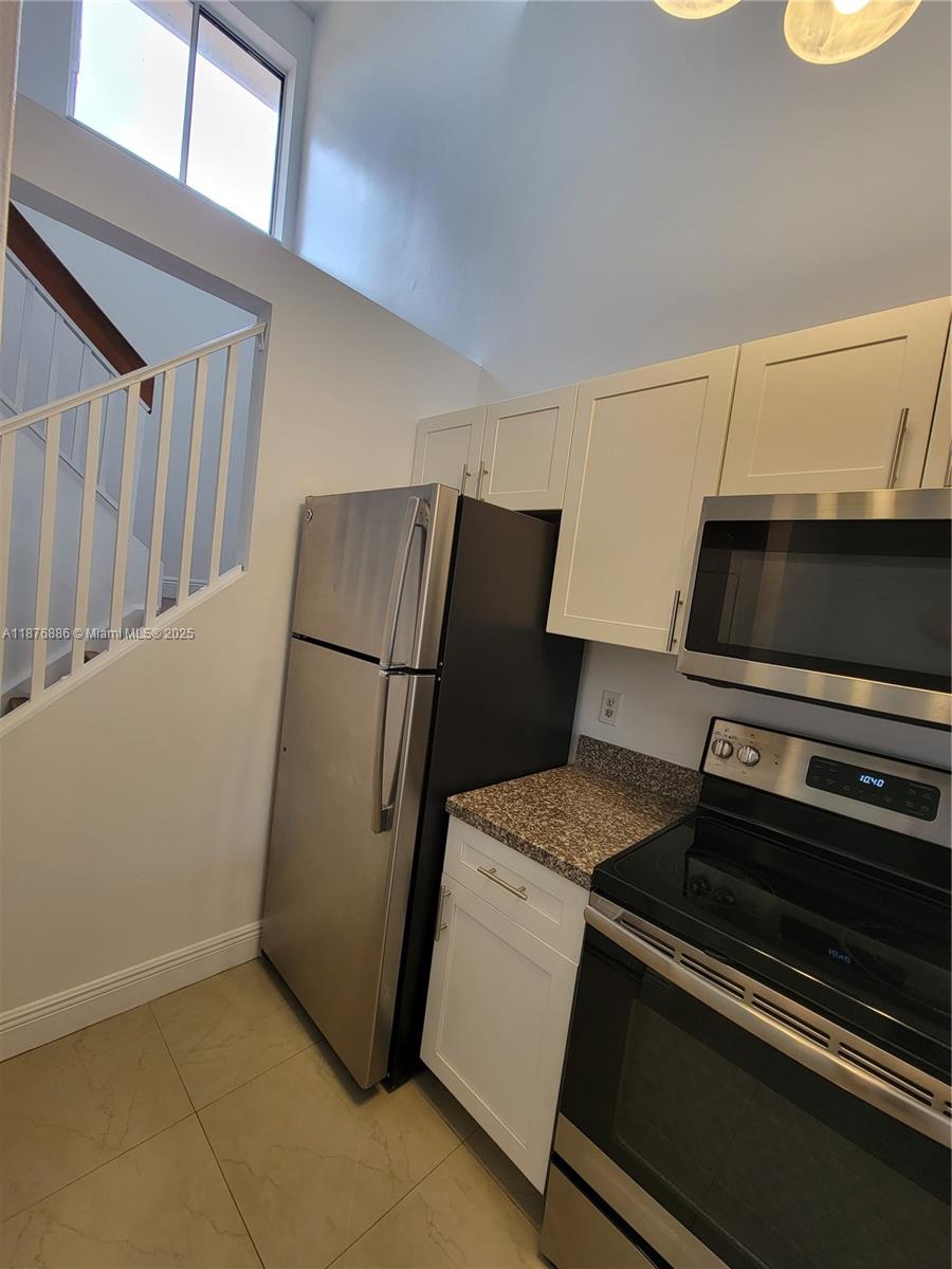 NAPOLI GARDENS AT CORAL S - Residential