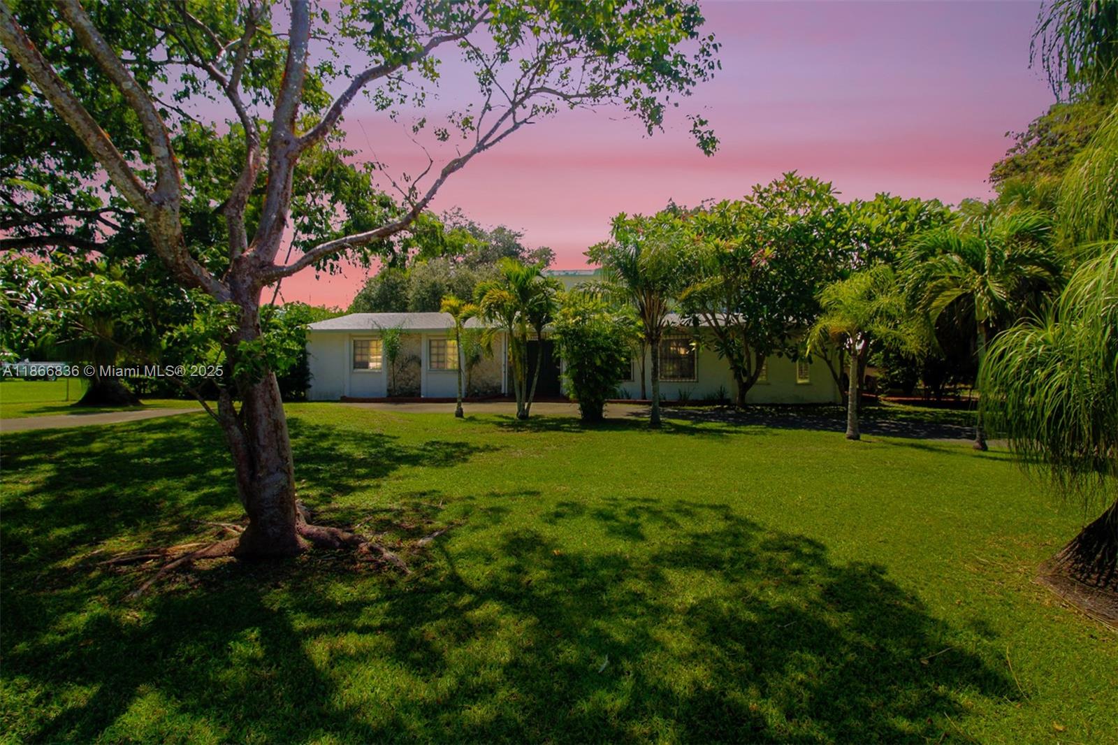 We like to call this Redland gem the "Bold & Beautiful. Timeless character & a little edge. A dramatic statement staircase greets you at the entrance, flanked by towering windows that flood the space w/natural light & flair. Sitting on a 39,900 SF private fenced lot. The main estate & guest house both have a new roof. Main home is 3bed/2.5bath w/lg extra room (loft) upstairs. Guest House is a 1bed/1bath. Less than 10 y/o gorgeous pool perfect for South Florida's sunny days year round. Expansive yard to entertain, park equip, toys, RV, boat or enjoy the quiet charm of Redland life. Bones are solid, layout is generous, and the potential? Endless. Restore her or give her a modern makeover, this bold beauty is ready for her next chapter. 2 new AC units. Mango, mulberry, avocado & mango trees.