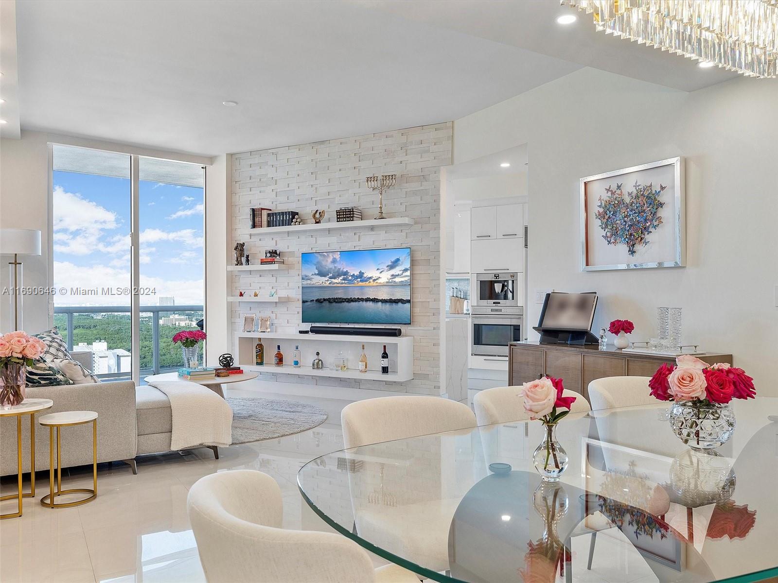 Welcome to Florida living at its best! Discover breathtaking water views from this luxurious 2-bedroom 2-bath condo at the iconic Trump Tower III in Sunny Isles Beach. This elegant residence features floor-to-ceiling hurricane impact windows, a spacious open floor plan, and a sleek kitchen with quartz countertops and top-of-the-line appliances. The living area boasts a custom marble TV wall unit, while the master suite offers a generous walk-in closet with brand-new custom cabinetry and a spa-like ensuite bathroom. Enjoy private elevator entry, marble floors, and a large balcony perfect for taking in the stunning Intracoastal sunset views. The building offers world-class amenities, including a fitness center, spa, pool, and direct beach access. Live the ultimate beachfront lifestyle!