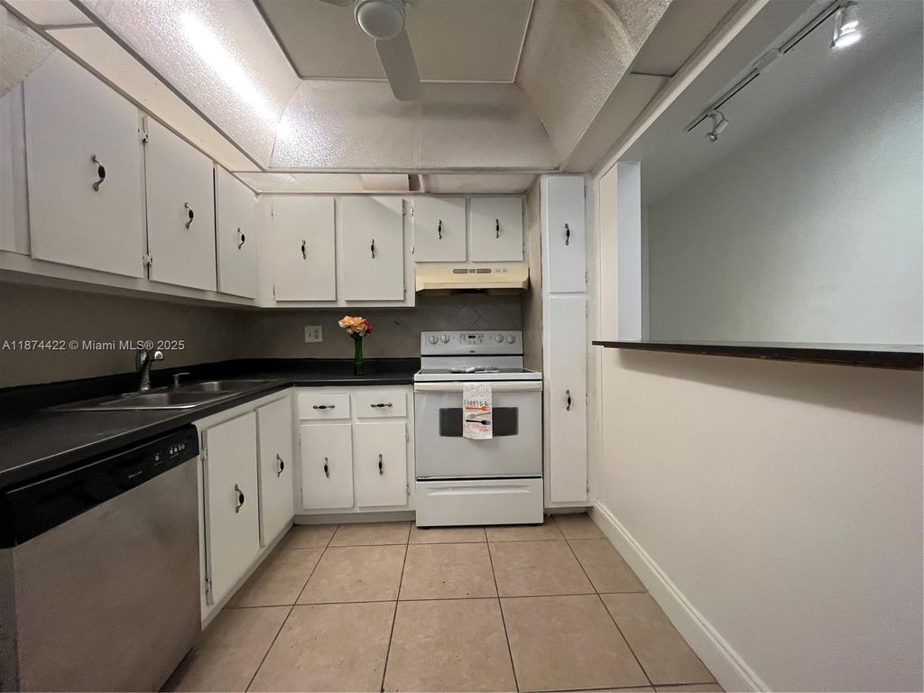 Photo of 4354 NW 9th Ave #13-3C, Deerfield Beach, FL 33064 (MLS # A11874422)