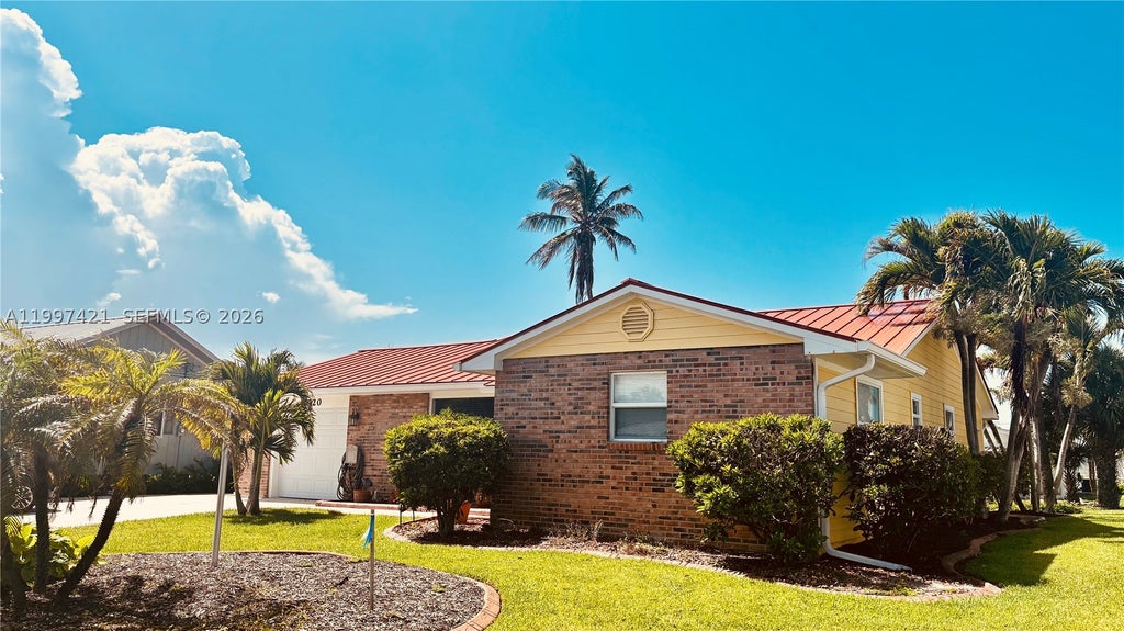 Photo of 1920 Eucalyptus Ave, Hutchinson Island, FL 34949 (MLS # A11997421)