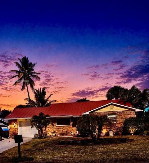 Photo of 1920 Eucalyptus Ave, Hutchinson Island, FL 34949 (MLS # A11997421)