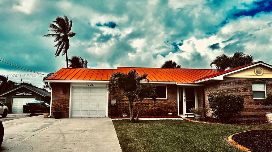 LOCATION! LOCATION! LOCATION! BEACHSIDE LIVING AT IT'S BEST! LITERALLY STEPS TO THE BEAUTIFUL OCEAN BEACHES! From your backyard, walk to Indian River Lagoon Jaycee Park, with beach, boat & jetski ramps, tennis & pickleball courts, and picnic pavilions! Bring your metal detector and treasure hunt on one of three ocean beaches within walking distance! NO HOA! First time offering, welcoming pristine 3/2 Island Home with 1 car garage.  Hardiplank siding on 3 sides, refaced brick on front Meticulously maintained and painted inside and out, impact glass all around, top of line metal roof, new Lennox AC in 2024, hardwood flooring, remodeled cook's kitchen with tons of cabinetry! Den/Office or 3rd bedroom w/closet. Storage everywhere including garage! Bring the RV! Extra concrete pad, 50 Amp transfer box & generator hookup and your own RV clean out!  125 gal underground propane tank, tankless hot water heater, auto sprinklers, room for a pool, has 10x10 storage shed! They chose highest lot to build! You can get access to private community deeded beach for $75 yearly. All utilities covered under one payment, runs around $200 on average. Very economical home! Seller does have wind mitigation from 2024, front door is not hurricane impact, everything else is. Close to South Hutchinson Island shopping & dining! Feel like you are on vacation everyday, with the beautiful drive to this home. Surrounded by water, intracoastal to ocean!