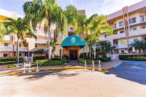 Photo of 7440 Granville Dr #213, Tamarac, FL 33321 (MLS # A11894745)