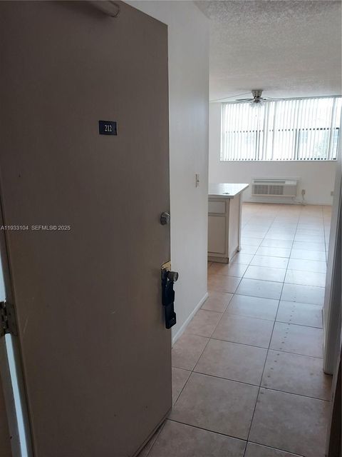 Photo of 2501 Riverside Dr #212-A, Coral Springs, FL 33065 (MLS # A11933104)