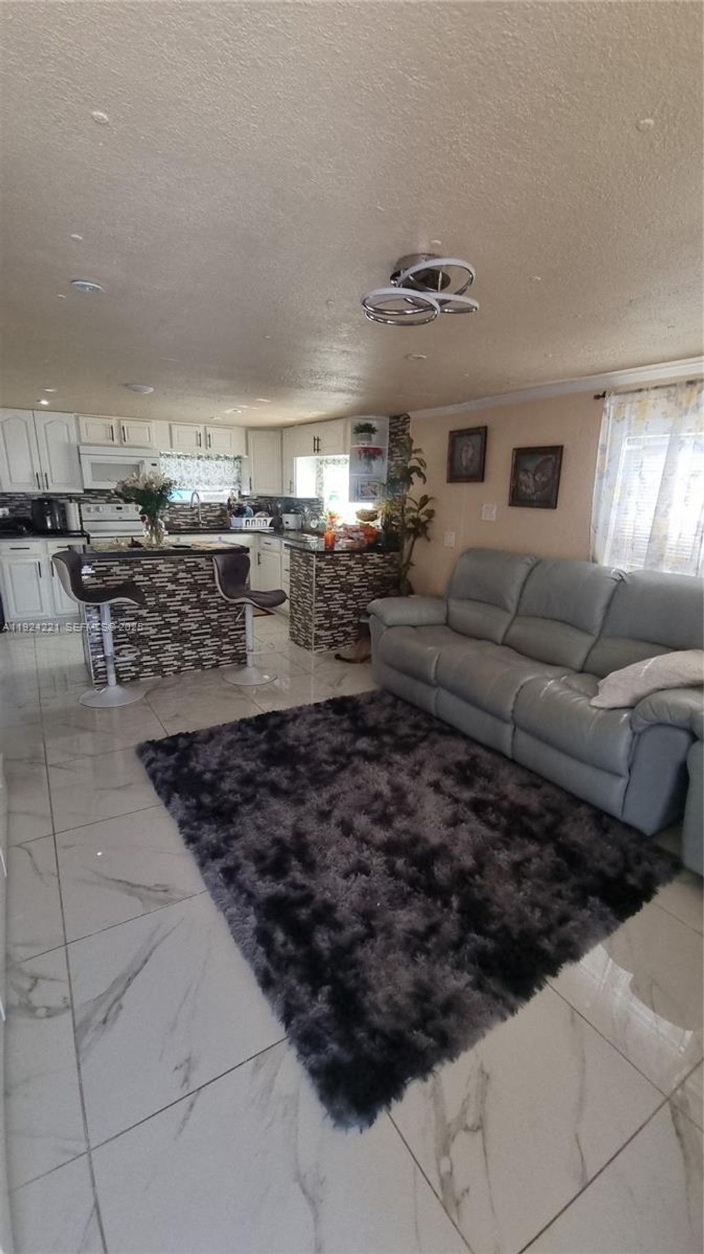 Photo of 3170 SW 8th St LOT K 1007, Miami, FL 33135 (MLS # A11924221)