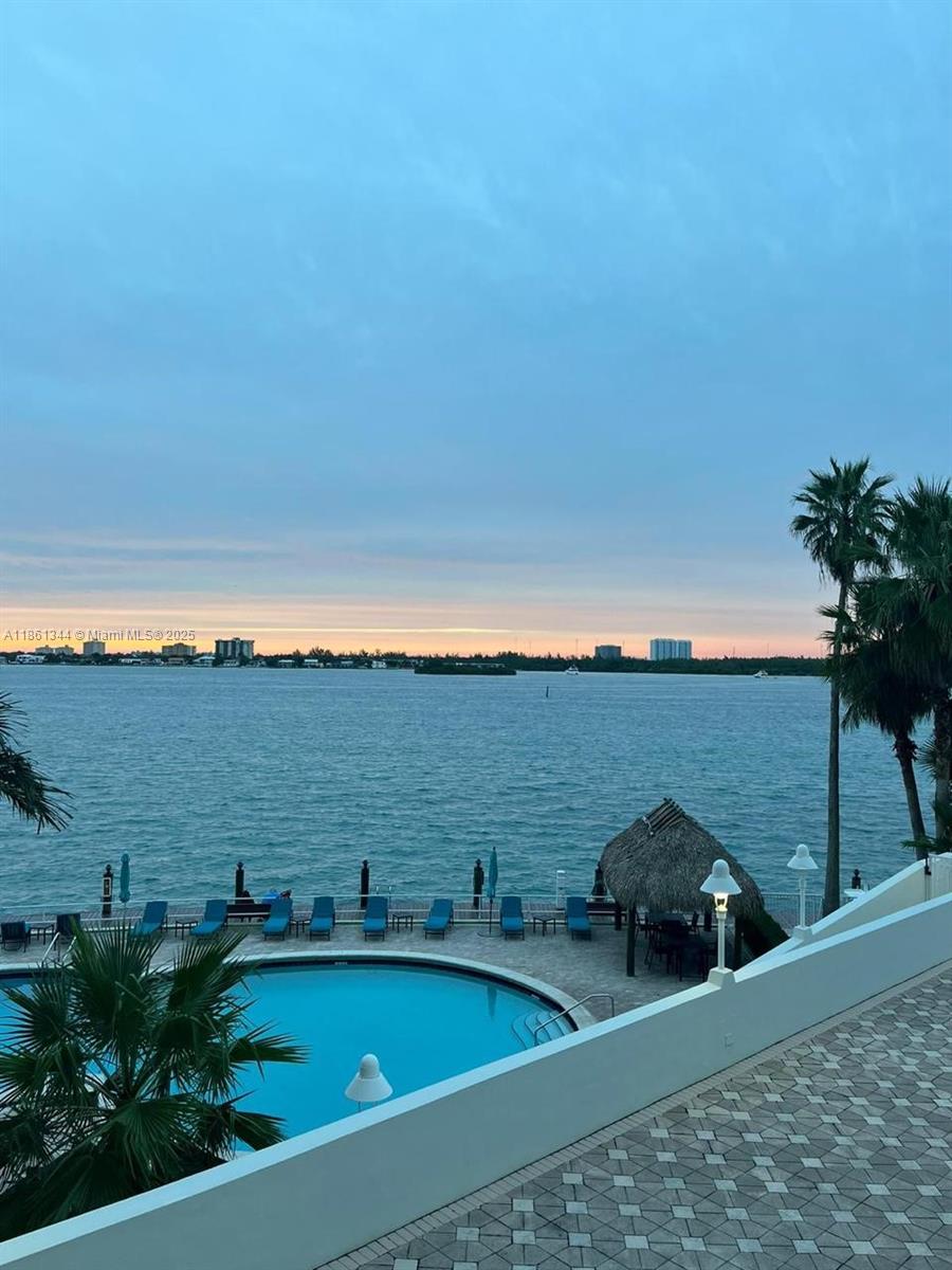 Beautiful ample 950 sq ft unit with direct and unobstructed bay views. Northeast looking unit with incredible sunrises and night view. Very ample master bedroom and spacious den with plenty of storage space. Renovated unit with marble floors and black granite counter tops and all new paint. In unit washer and dryer, assigned parking space and hurricane shutters.
Bay side swimming pool, tiki huts, gym, clubroom.
24hrs front desk, on site management, internet and cable included and low power bills.
A really out of the ordinary unit in impeccable condition near Bal Harbor Shops and places of worship.