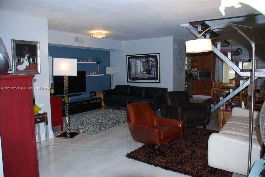 Townhouse bellow 290K in a very central location, fully updated, top of the line appliances, beautiful layout, just get your clothes and move in. This it is!!!, bring your buyer today, (Owner is a REALTOR) Spacious living area, with private patio and nice cover terrace, the property has 3 beds, 3 baths, and approximately 1,592 square feet. Remodeled kitchen with granite counters. Community amenities include pool, tennis courts, racquet ball court, security and clubhouse all with low maintenance fees....